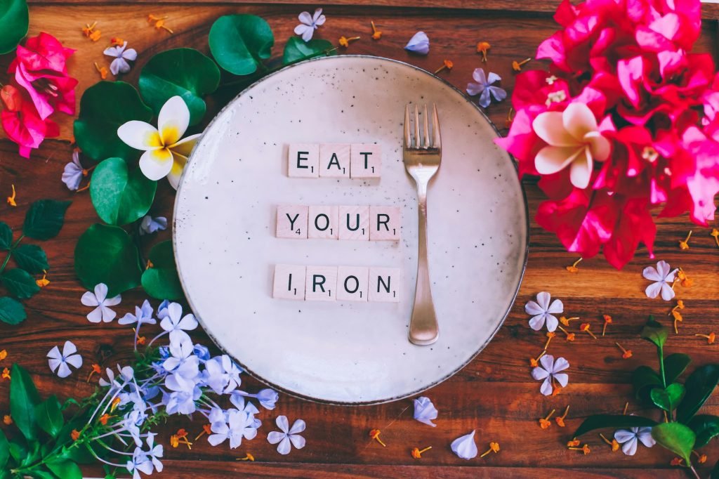 Iron deficiency and fork on a plate